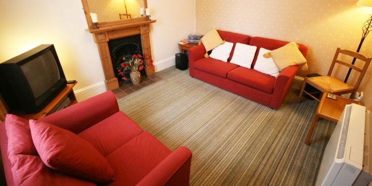 The cosy lounge has red fabric