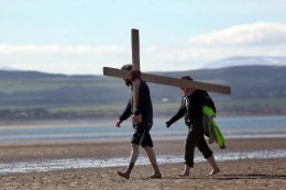 movie thumbnail, Pilgrims cross the Holy Island causeway on Good-friday 2016