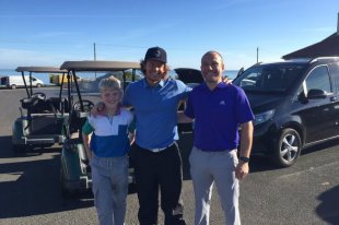 Jared Watson (right) posing with Mark Wahlberg after he played golf at Bamburgh Castle club. The star took in some regarding the region's best golf programs while shooting the Transformers